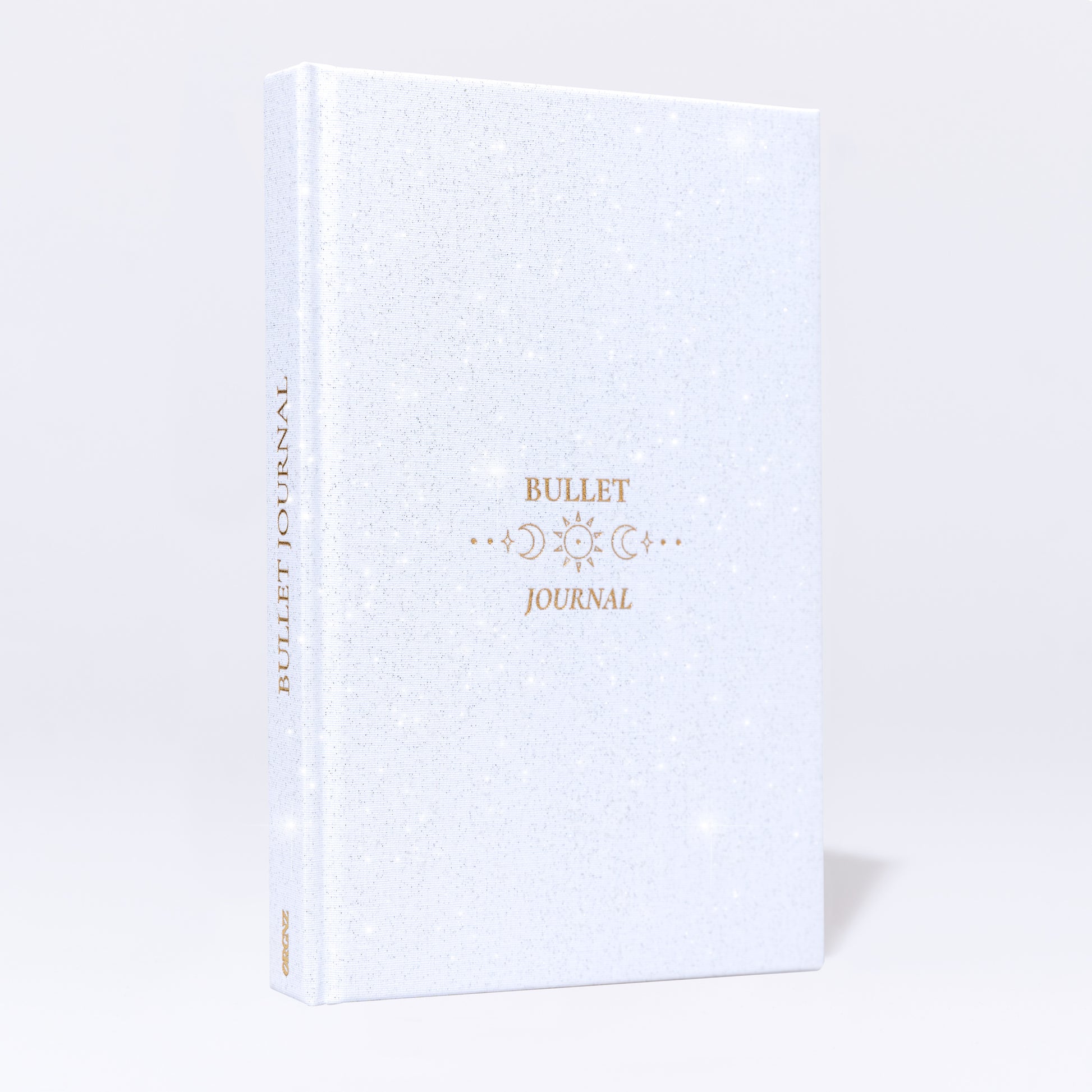 Bullet Journal A5 Snow Frontansicht mit Glitzer Stoffeinband und Goldprägung